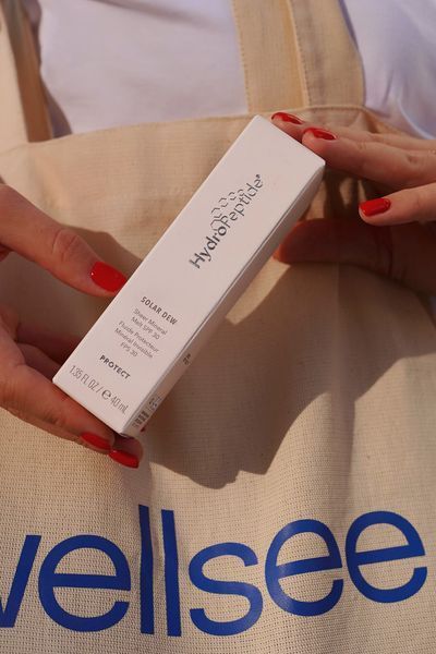 Мінеральна сироватка SPF 30 Solar Dew Hydropeptide HP26 фото
