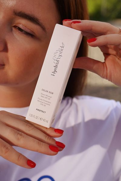 Мінеральна сироватка SPF 30 Solar Dew Hydropeptide HP26 фото